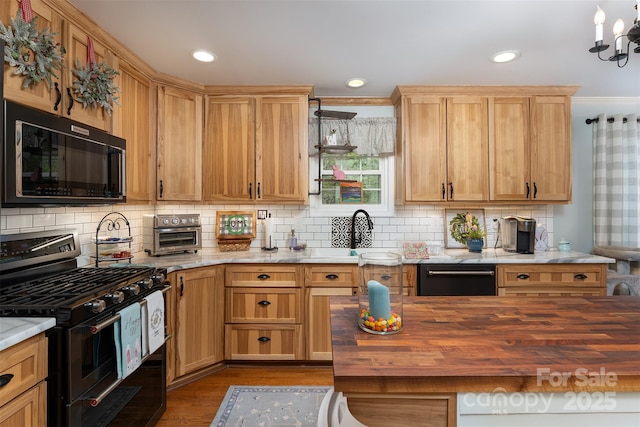 7788 Parks Mountain Dr, Newland, NC 28657 - kitchen with black appliances, wooden counters, a sink, backsplash, and recessed lighting