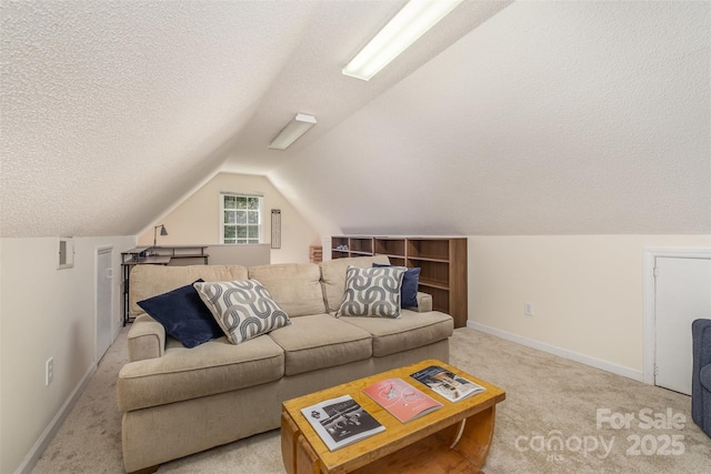127 Fantasy Ln, Mooresville, NC 28117 - living room featuring light colored carpet, a textured ceiling, vaulted ceiling, and baseboards