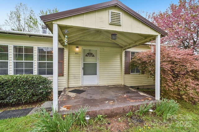property entrance with a patio