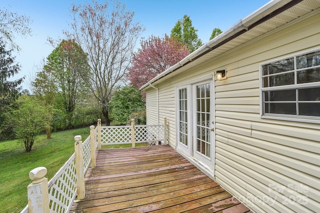 deck featuring a lawn