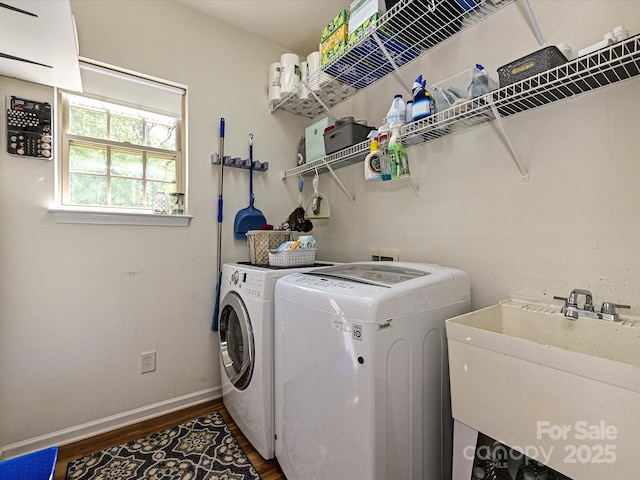 3914 Cassidy Dr, Waxhaw, NC 28173 - laundry room featuring independent washer and dryer, dark wood-type flooring, and baseboards
