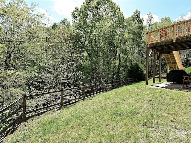 3914 Cassidy Dr, Waxhaw, NC 28173 - view of grassy yard with stairs, a deck, and a patio area