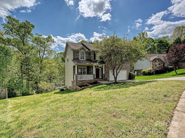 3914 Cassidy Dr, Waxhaw, NC 28173 - view of front of house featuring covered porch, a garage, a front yard, and concrete driveway