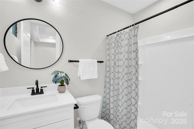 3449 Byrnes St, Charlotte, NC 28205 - bathroom with toilet, shower / bath combo with shower curtain, and vanity