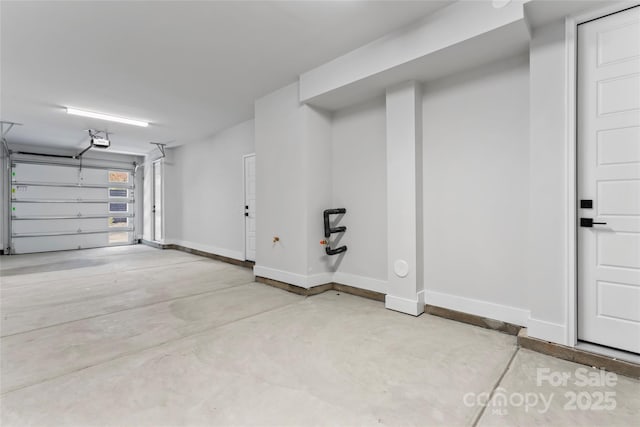 3449 Byrnes St, Charlotte, NC 28205 - garage with baseboards and a garage door opener