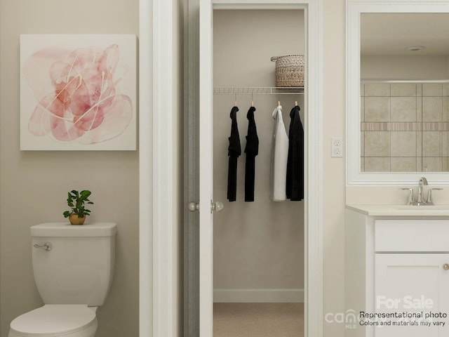 1512 Croydon St, Indian Land, SC 29707 - bathroom featuring toilet, baseboards, and vanity