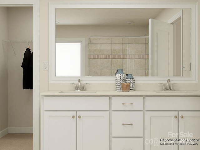1512 Croydon St, Indian Land, SC 29707 - bathroom featuring double vanity, a sink, and baseboards