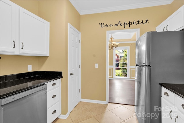 4155 Guilford Ct NW, Concord, NC 28027 - kitchen with appliances with stainless steel finishes, crown molding, dark stone counters, a chandelier, and white cabinetry