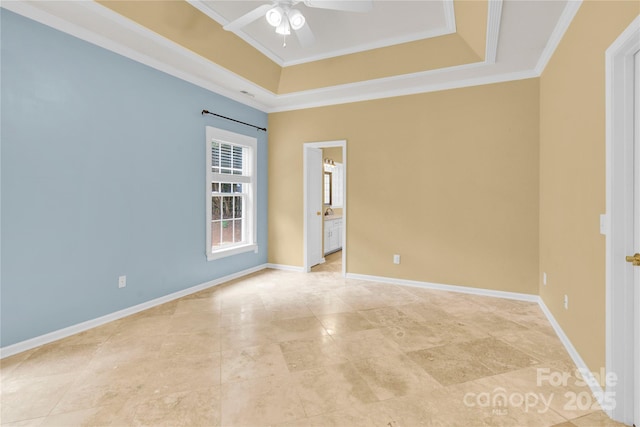 4155 Guilford Ct NW, Concord, NC 28027 - spare room with a tray ceiling, ceiling fan, ornamental molding, and baseboards