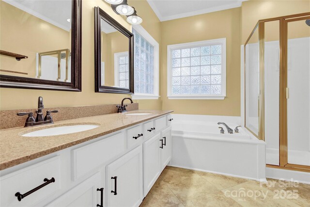 4155 Guilford Ct NW, Concord, NC 28027 - bathroom with a stall shower, double vanity, a bath, and ornamental molding