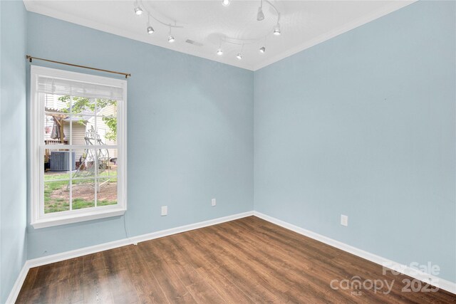 4155 Guilford Ct NW, Concord, NC 28027 - unfurnished room with baseboards, wood finished floors, and crown molding