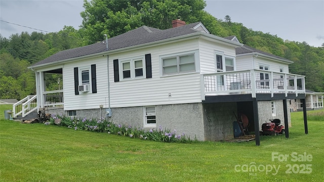 18 Misty Meadows Rd, Burnsville, NC 28714 - view of property exterior with a yard, a wooden deck, and a view of trees