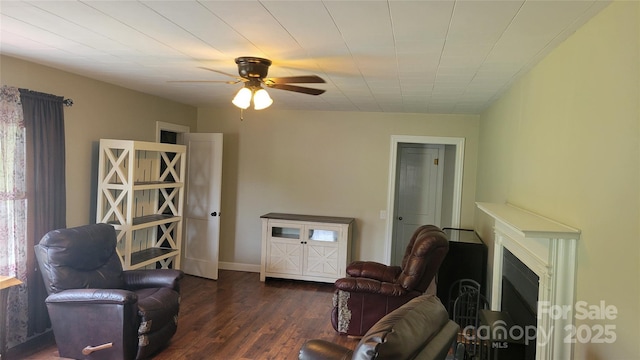 18 Misty Meadows Rd, Burnsville, NC 28714 - living area with plenty of natural light, wood finished floors, a ceiling fan, and a fireplace