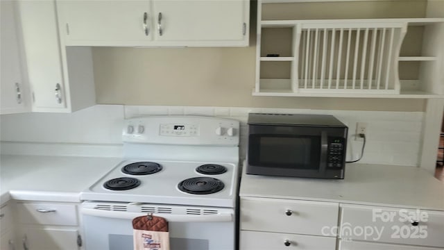 18 Misty Meadows Rd, Burnsville, NC 28714 - kitchen with white range with electric cooktop, white cabinetry, light countertops, and open shelves