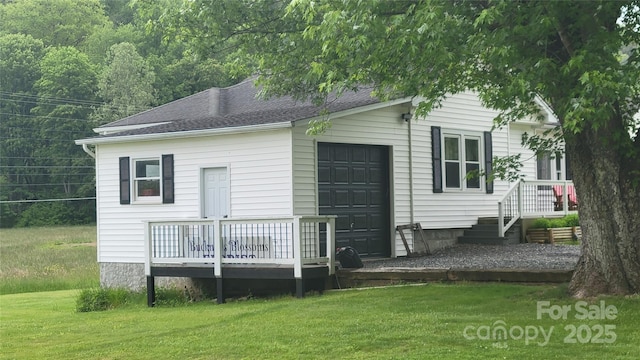 18 Misty Meadows Rd, Burnsville, NC 28714 - rear view of house with a lawn, a shingled roof, and a deck