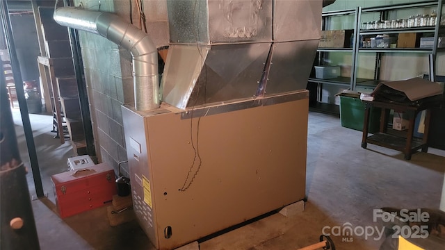 18 Misty Meadows Rd, Burnsville, NC 28714 - utility room featuring heating unit