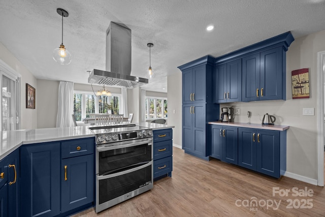 159 Long John Dr, Hendersonville, NC 28791 - kitchen with a textured ceiling, double oven range, blue cabinetry, and extractor fan