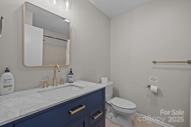 159 Long John Dr, Hendersonville, NC 28791 - full bath with toilet, tile patterned floors, vanity, and baseboards