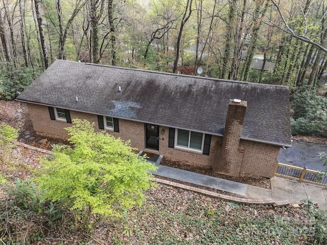 159 Long John Dr, Hendersonville, NC 28791 - ranch-style house with roof with shingles, a chimney, and brick siding