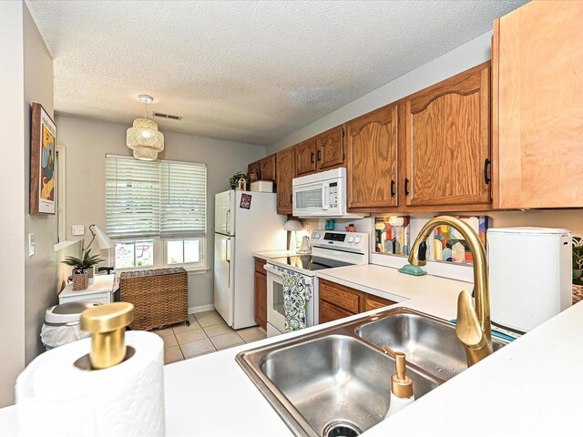 9305 Four Mile Creek Rd, Charlotte, NC 28277 - kitchen featuring brown cabinetry, light countertops, white appliances, and a sink
