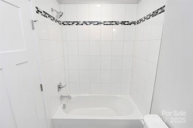 full bathroom with toilet and shower / bathtub combination