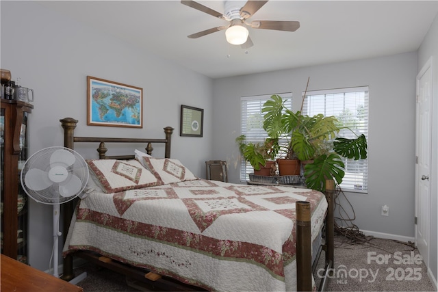 bedroom with baseboards, a ceiling fan, and carpet flooring