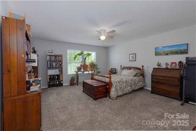 carpeted bedroom with baseboards and a ceiling fan