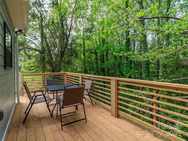 deck featuring outdoor dining space