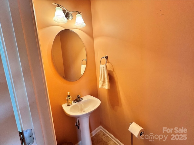 bathroom with tile patterned flooring