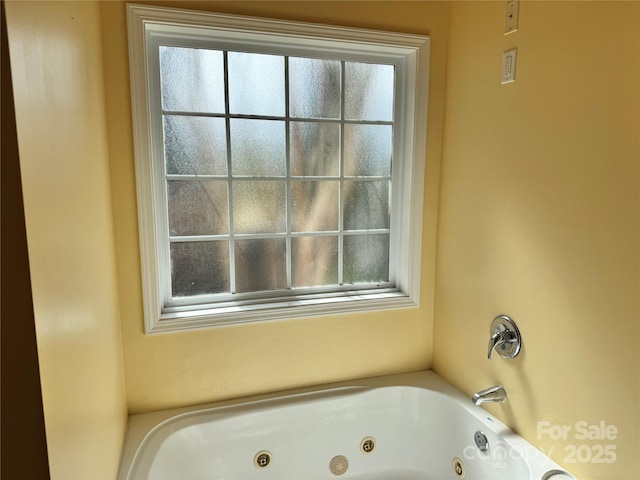 full bath with a jetted tub