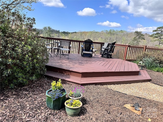 deck with a forest view