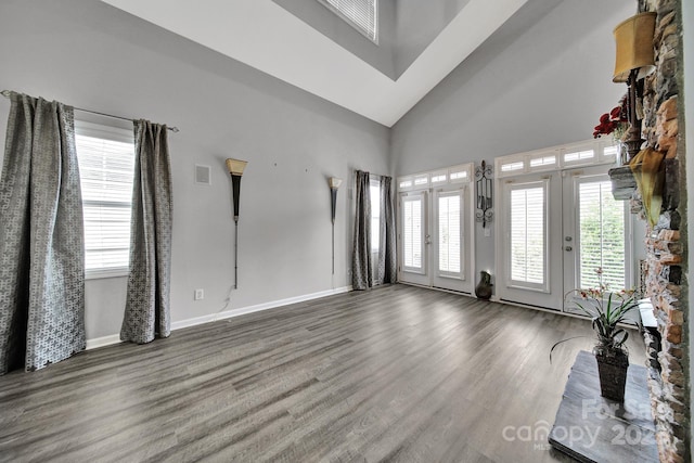 314 Wave Crest Dr, Tega Cay, SC 29708 - interior space featuring wood finished floors, visible vents, french doors, baseboards, and high vaulted ceiling