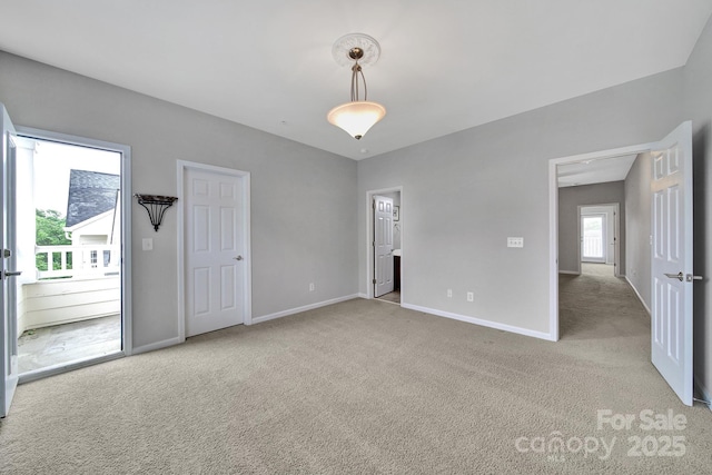 314 Wave Crest Dr, Tega Cay, SC 29708 - unfurnished bedroom featuring baseboards, access to outside, and carpet