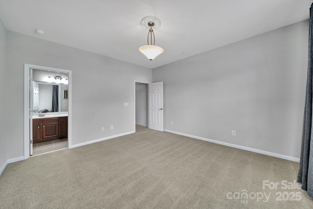 314 Wave Crest Dr, Tega Cay, SC 29708 - unfurnished bedroom featuring light colored carpet, baseboards, and ensuite bathroom