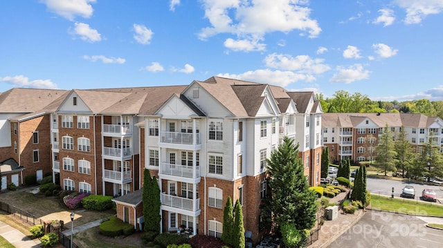 view of building exterior featuring a residential view