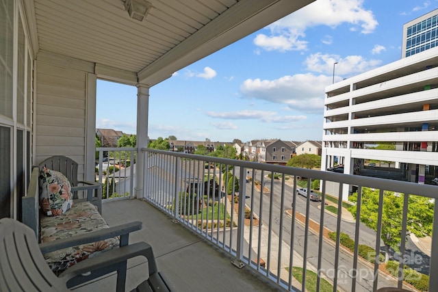 balcony featuring a residential view