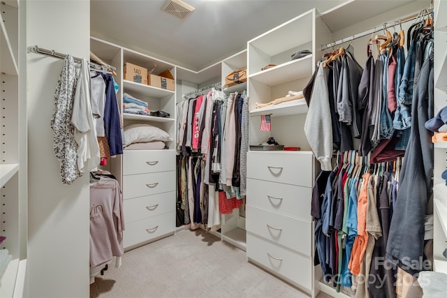 spacious closet with visible vents and light floors