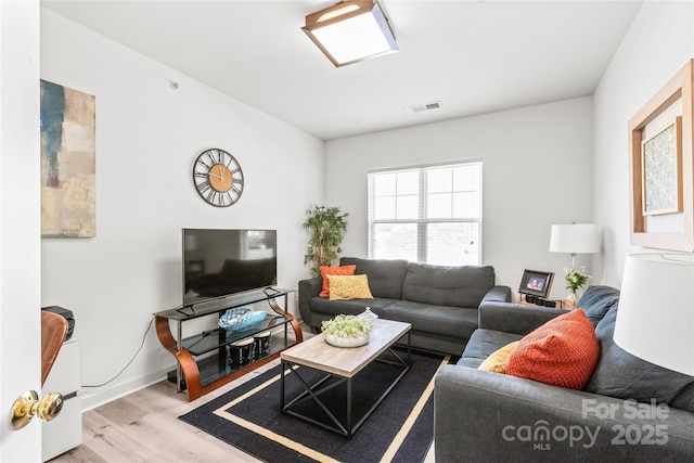 living room with wood finished floors