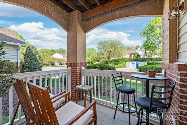balcony featuring covered porch