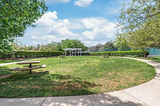 view of home's community with a pergola