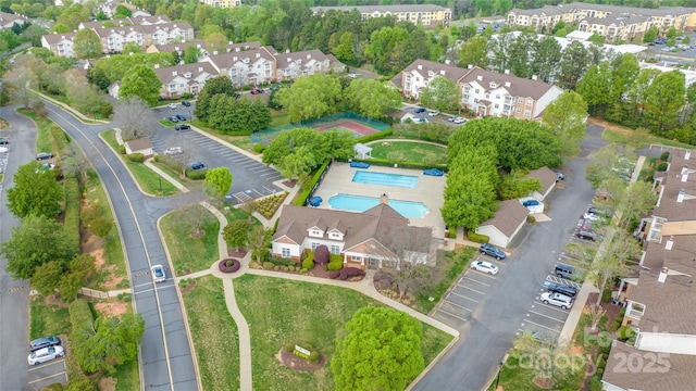 drone / aerial view of a pool area