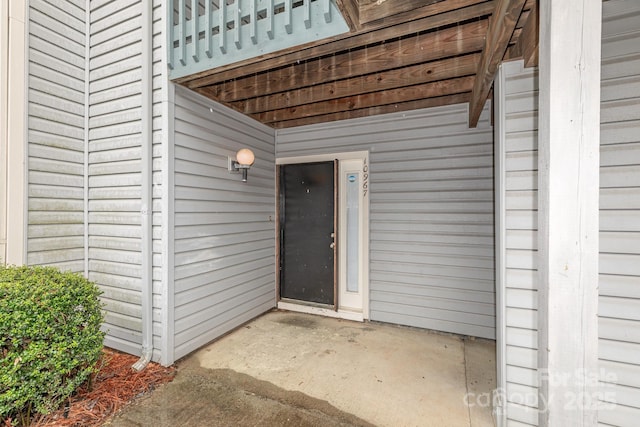 doorway to property with a patio