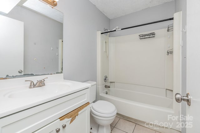 full bathroom with tile patterned floors, toilet, vanity, and  shower combination
