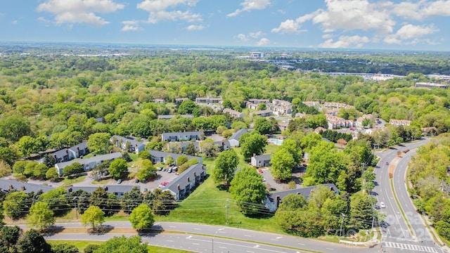 aerial view featuring a forest view