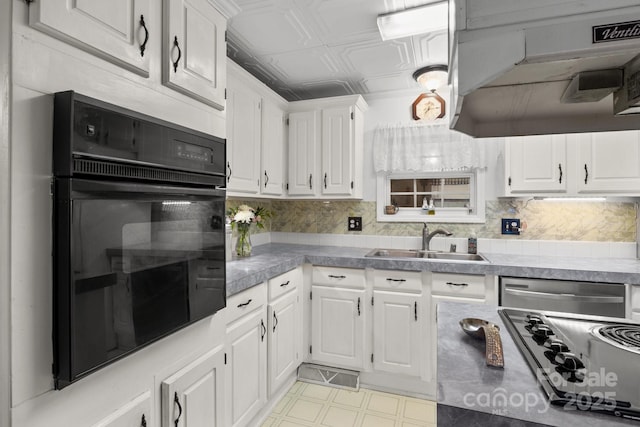 335 Ridgewood Dr, Mount Ulla, NC 28125 - kitchen with tasteful backsplash, white cabinetry, black appliances, an ornate ceiling, and a sink