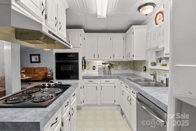 335 Ridgewood Dr, Mount Ulla, NC 28125 - kitchen featuring light countertops, an ornate ceiling, a sink, and black appliances