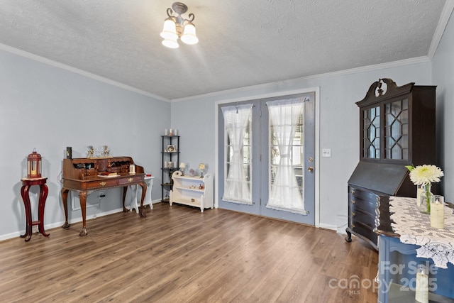 335 Ridgewood Dr, Mount Ulla, NC 28125 - sitting room with crown molding, wood finished floors, and a textured ceiling