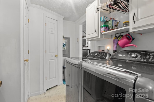 335 Ridgewood Dr, Mount Ulla, NC 28125 - laundry room with independent washer and dryer, a textured ceiling, light floors, and cabinet space