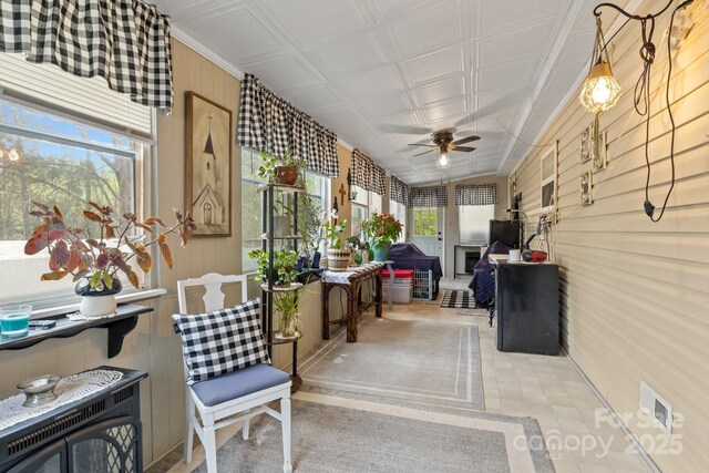 335 Ridgewood Dr, Mount Ulla, NC 28125 - sunroom with wooden walls and ceiling fan