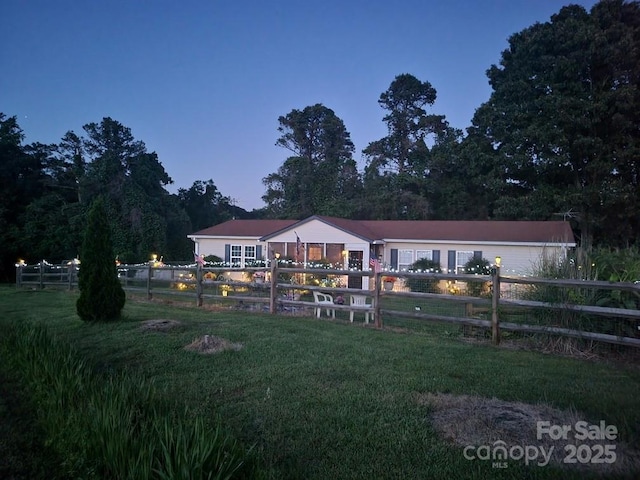 335 Ridgewood Dr, Mount Ulla, NC 28125 - rear view of property featuring a yard and fence